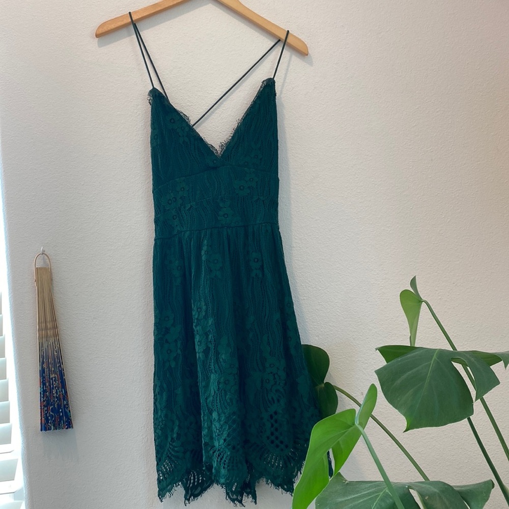 Lacy emerald green lace up dress; perfect for a wedding guest dress